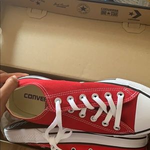 Red and white Converse sneakers low top